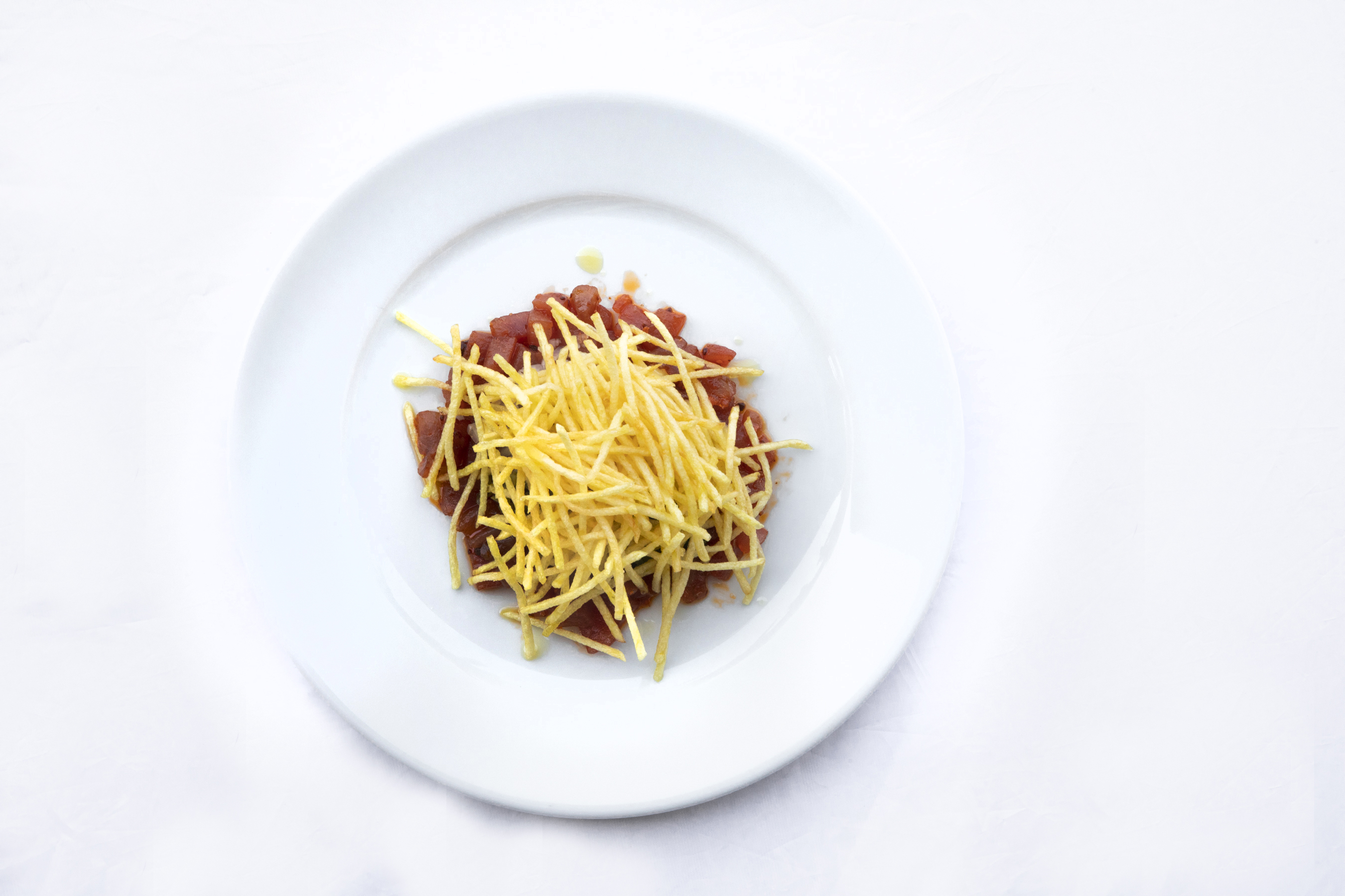 Tuna Tartare with shoestring potatoes